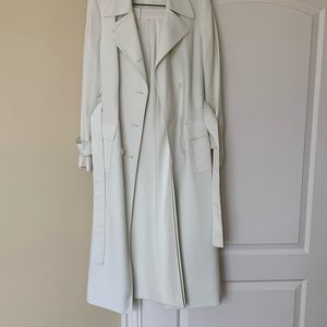 Wonderful designer pants and long jacket. Ivory color.